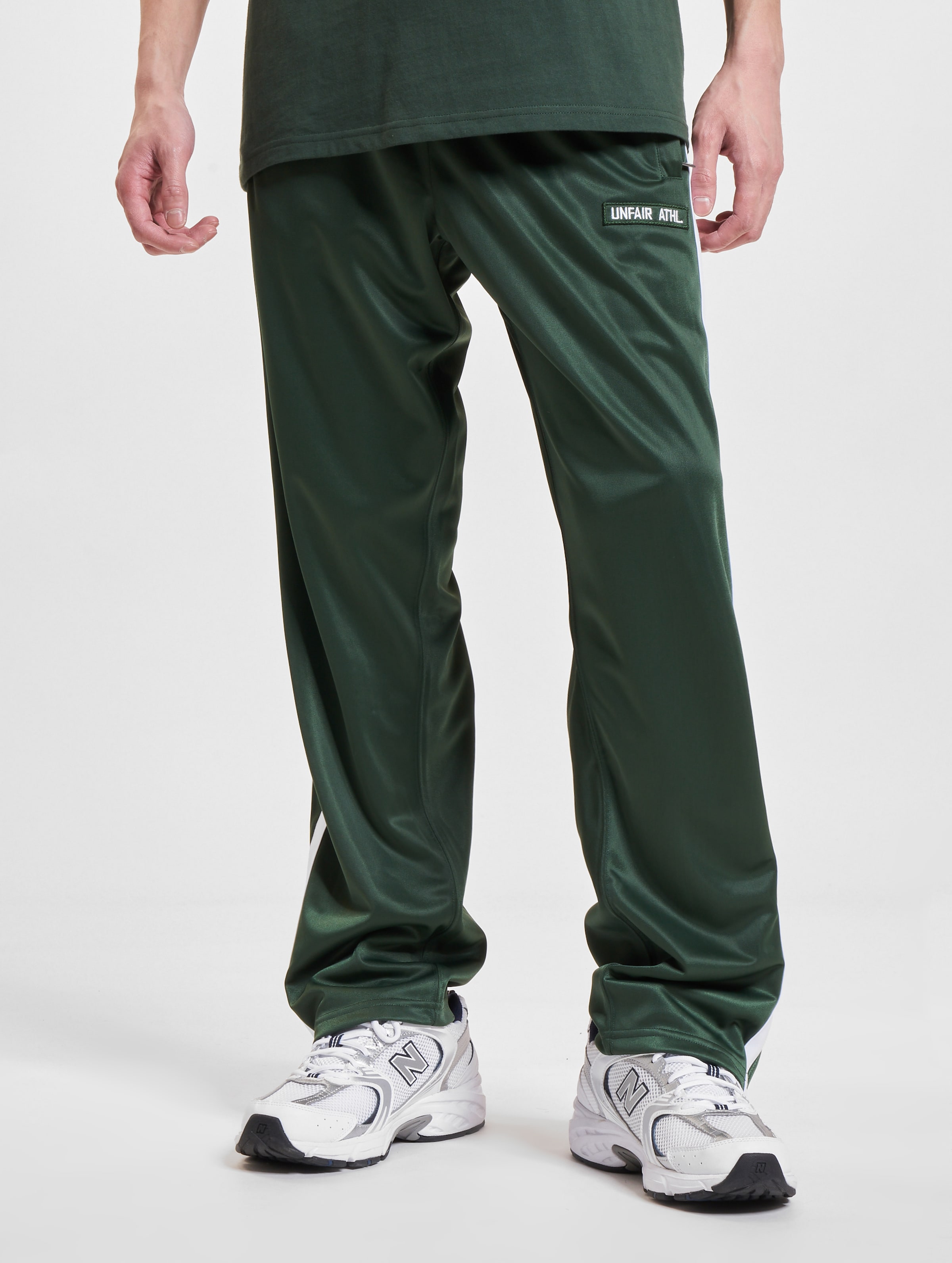 UNFAIR ATHLETICS DMWU Trackpants Evolution Green Vrouwen op kleur groen, Maat XL