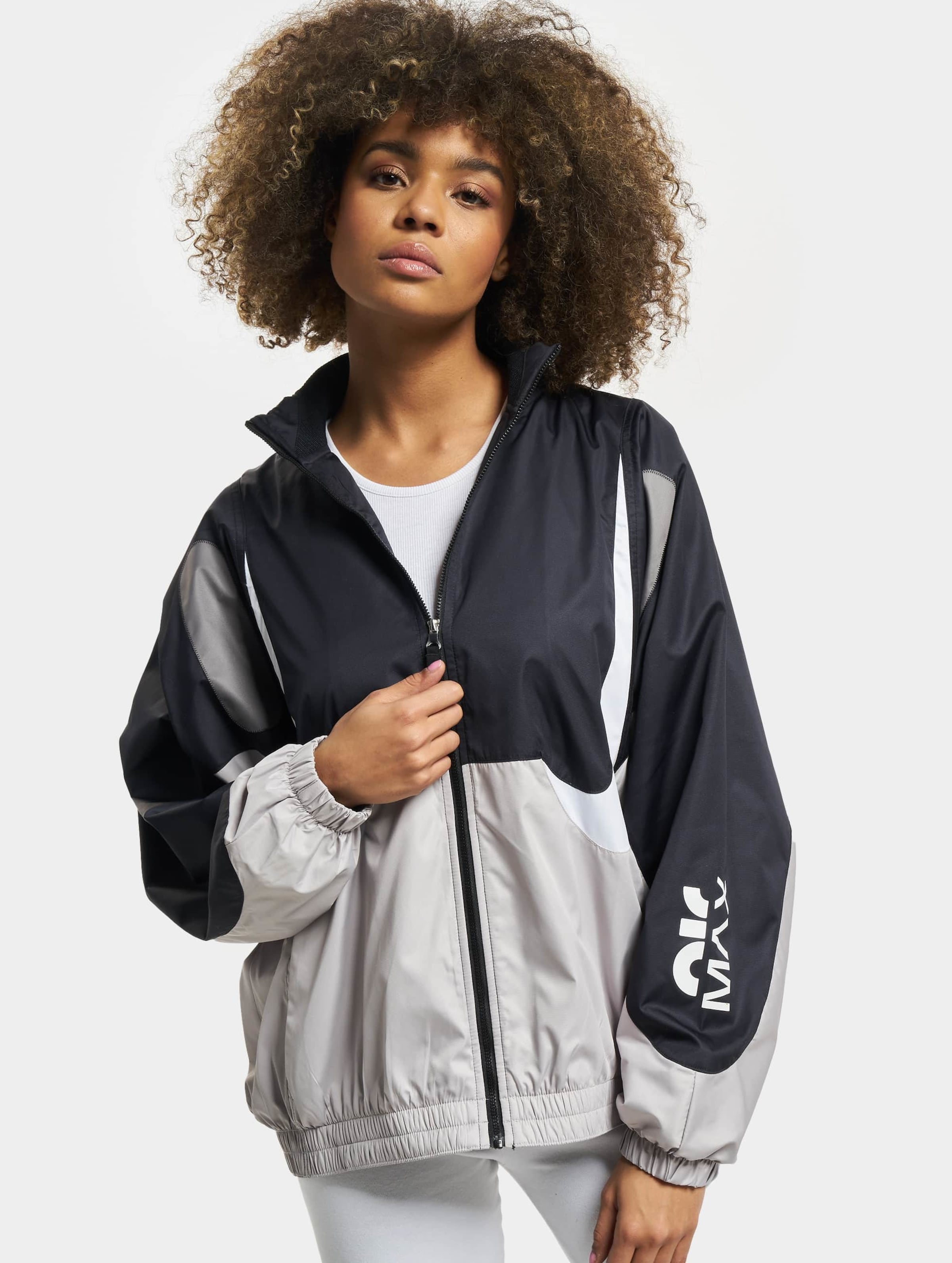 Black and white nike windbreaker womens online