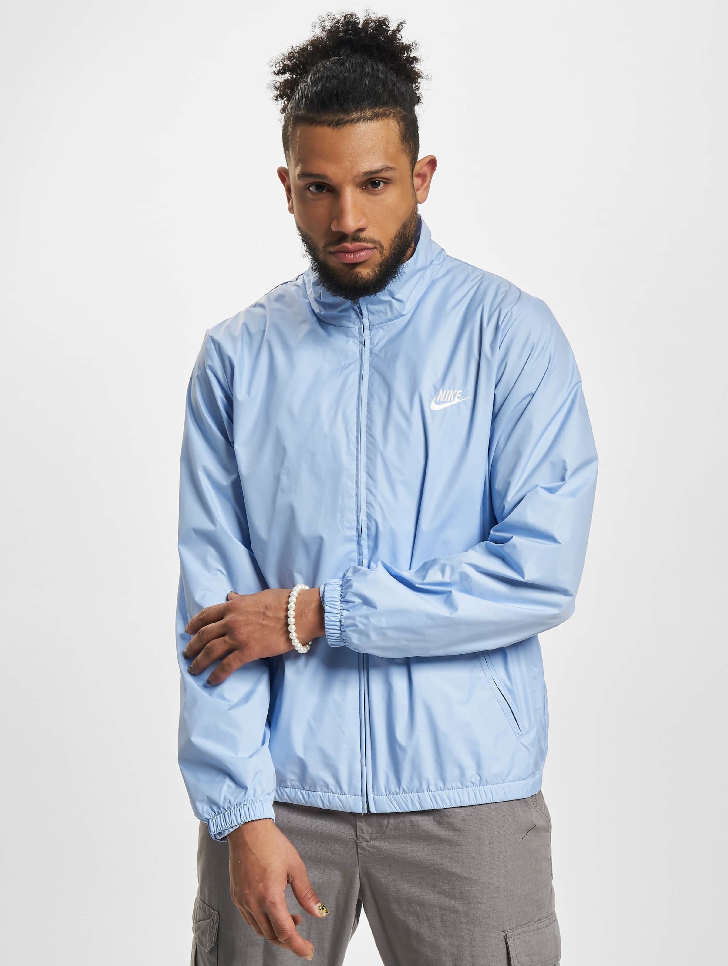 Nike hotsell teal windbreaker