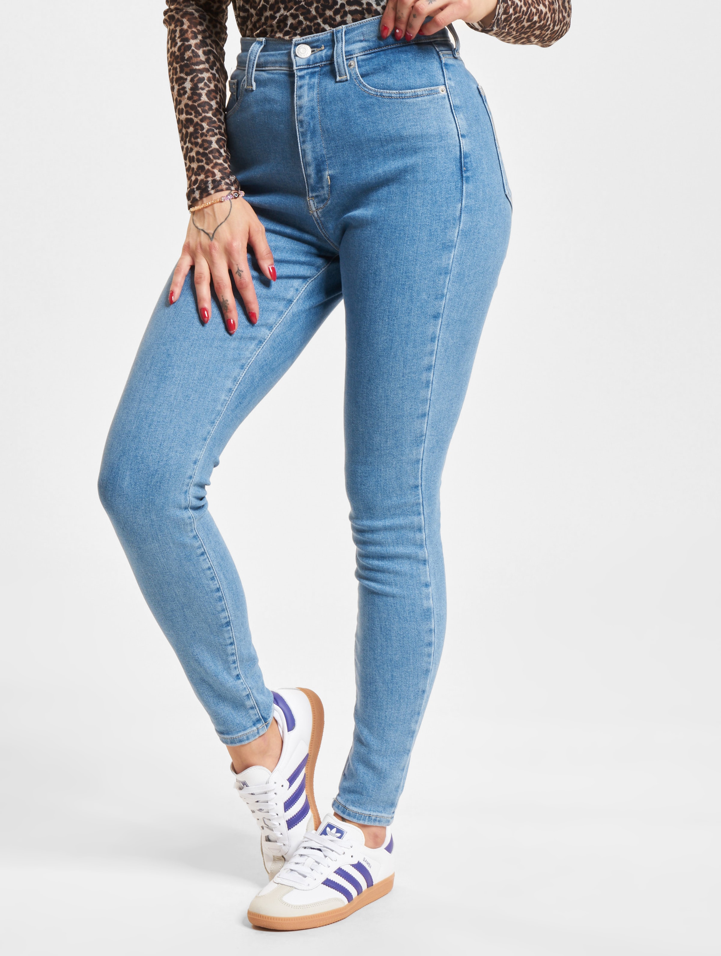 Tommy Jeans Sylvia op kleur blauw, Maat 27/30