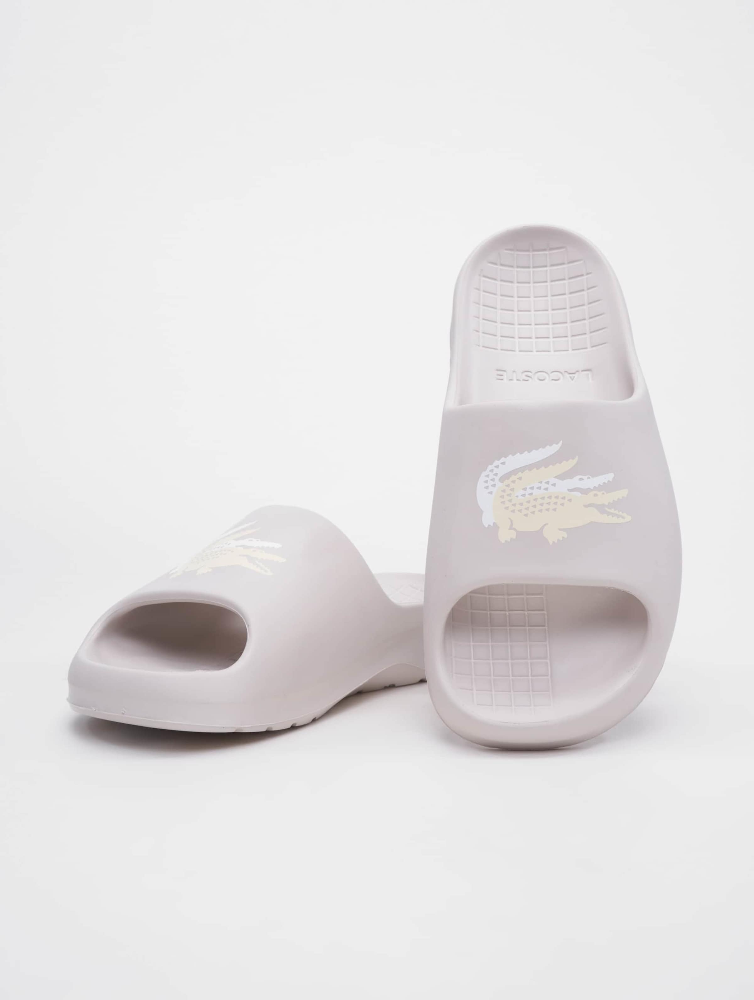 White and pink hot sale lacoste sliders