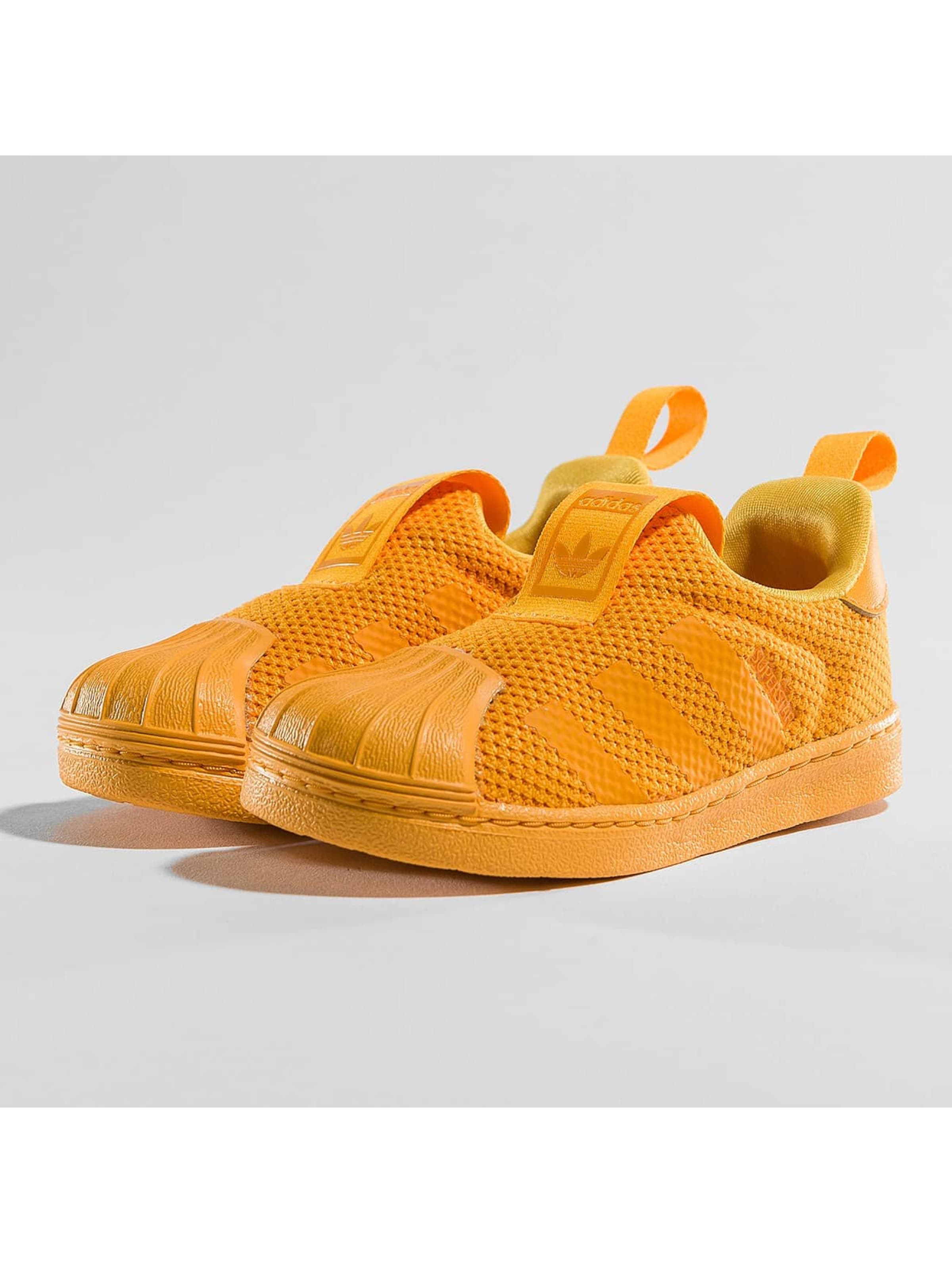 Adidas superstar slip cheap on yellow