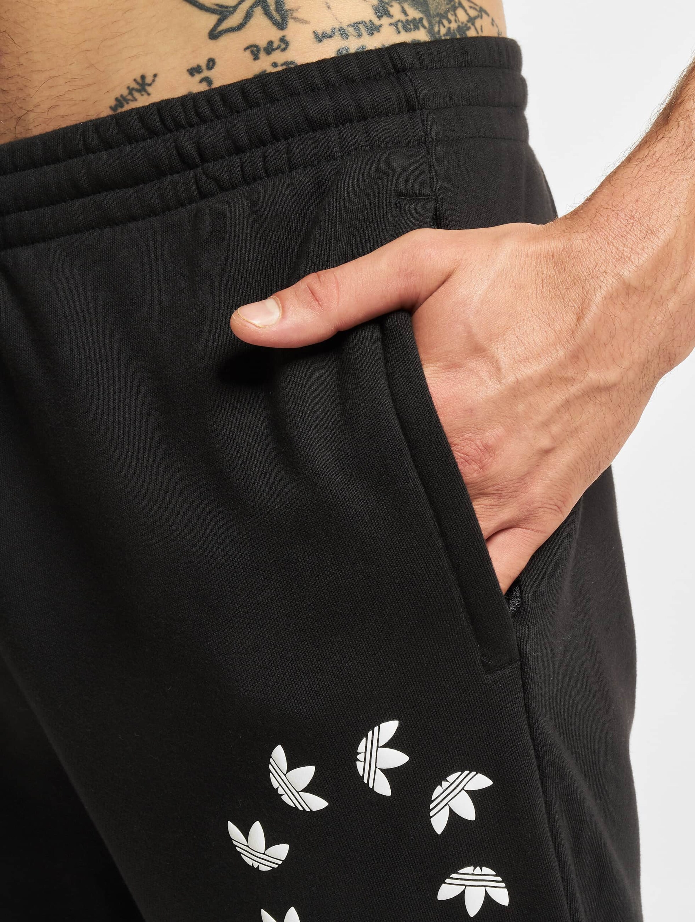 Adidas tape hot sale fleece pants