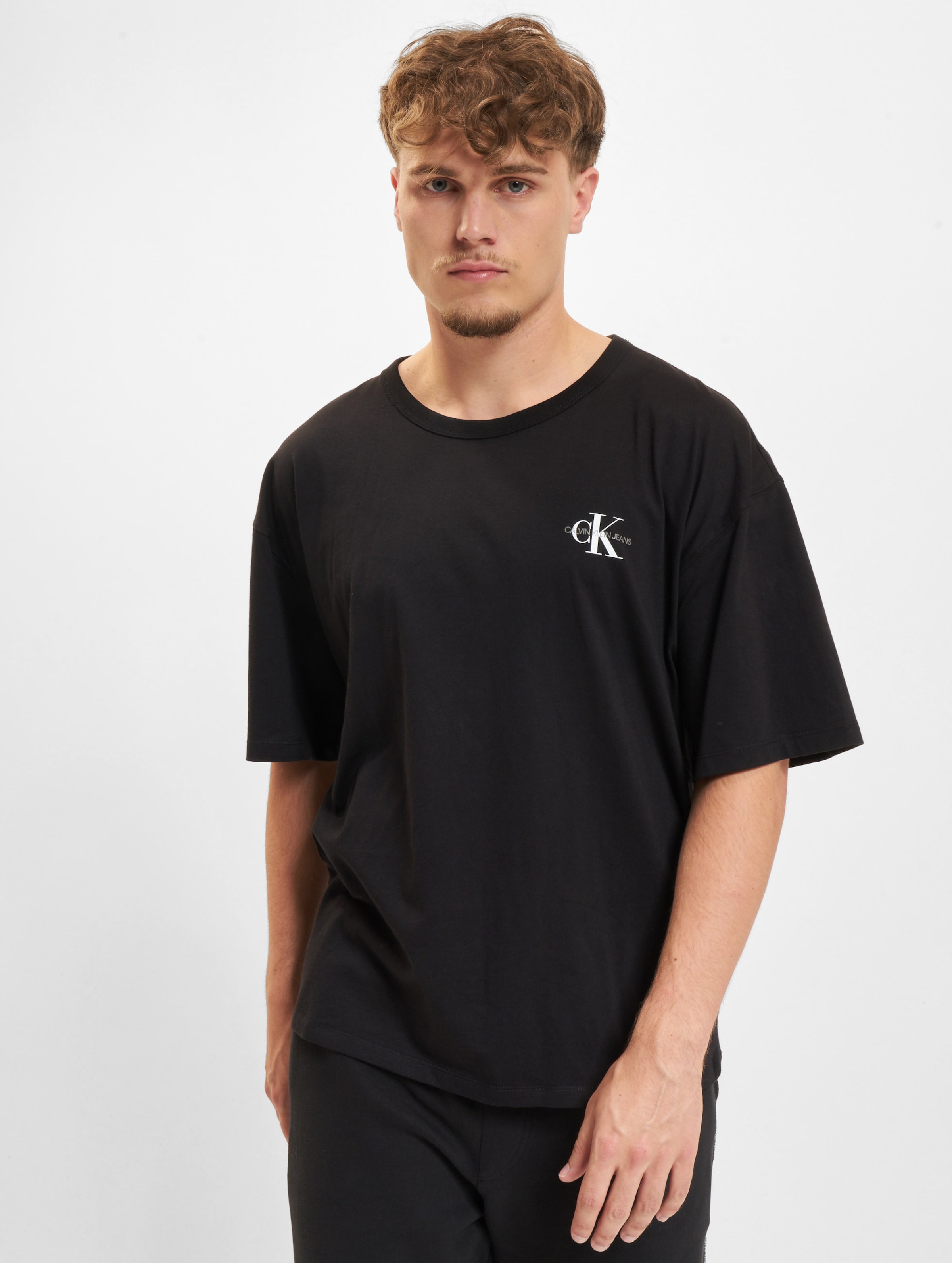 Calvin Klein Jeans Monogram Modern Relaxed Fit T-Shirt Männer,Unisex op kleur zwart, Maat L