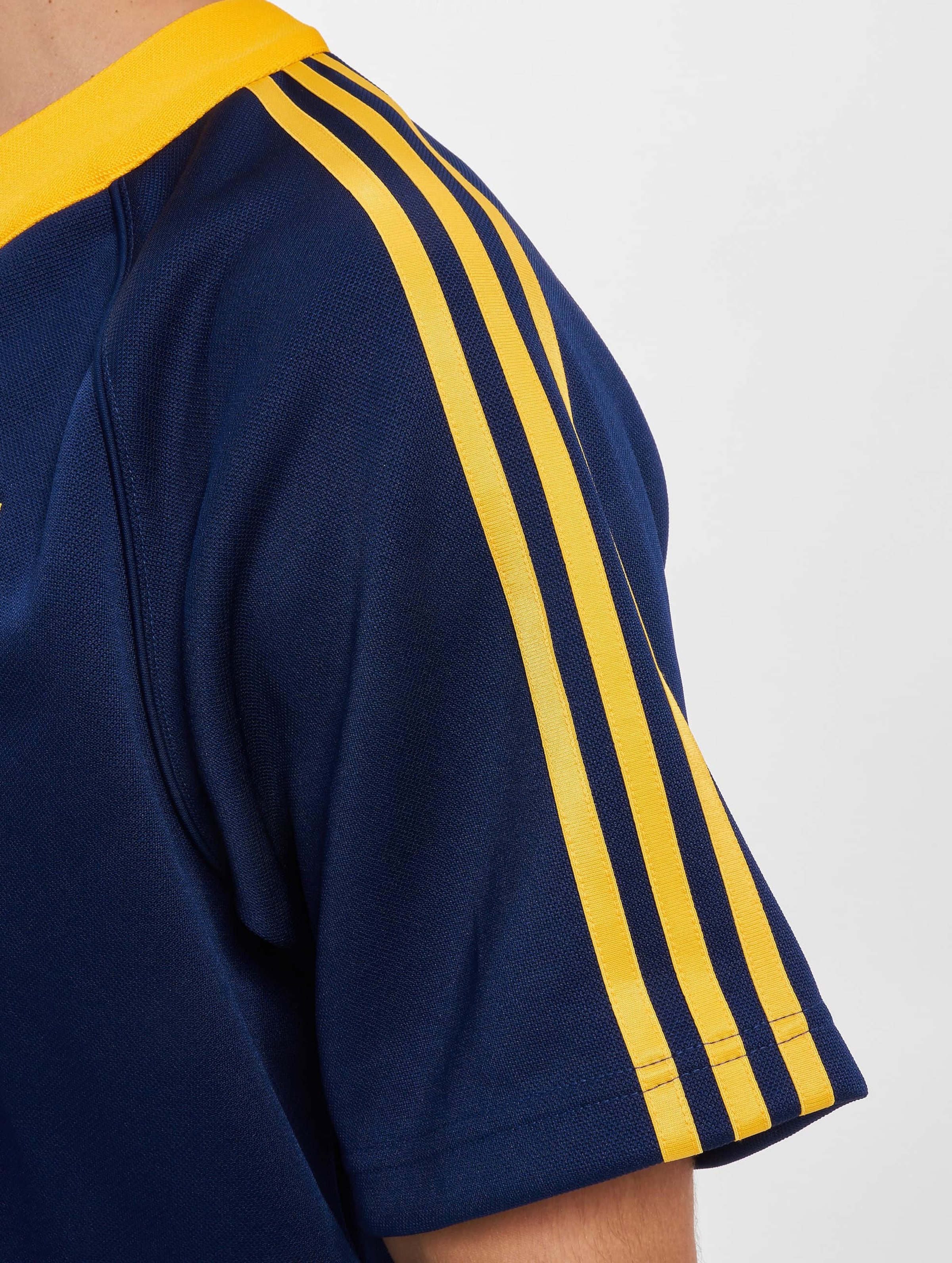 Adidas blue with outlet yellow stripes