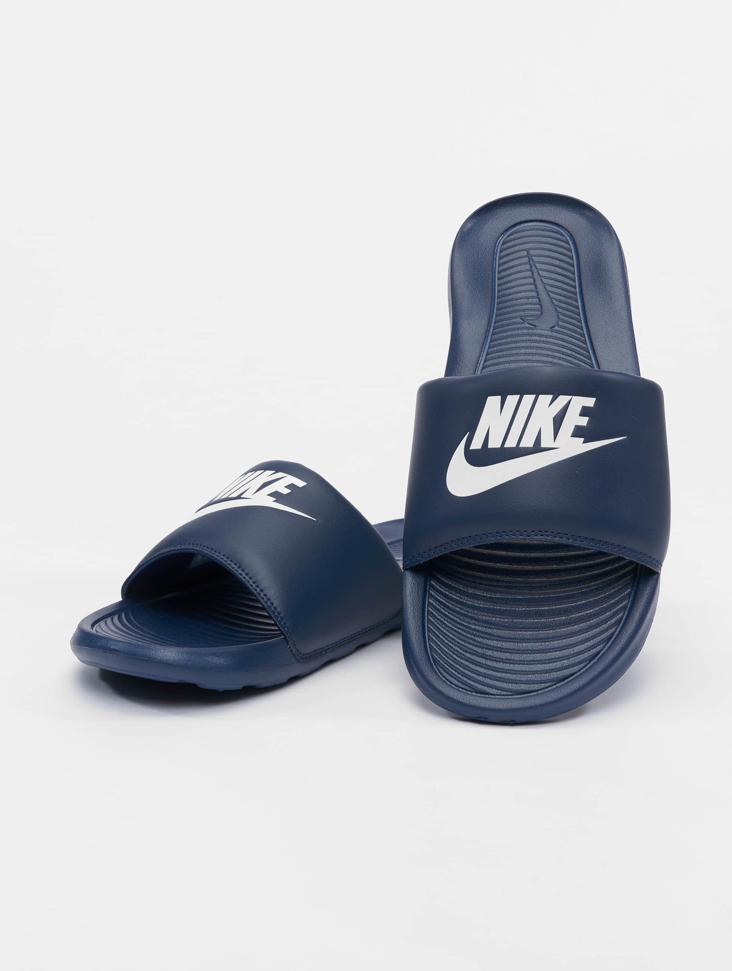 Nike hot sale navy sliders