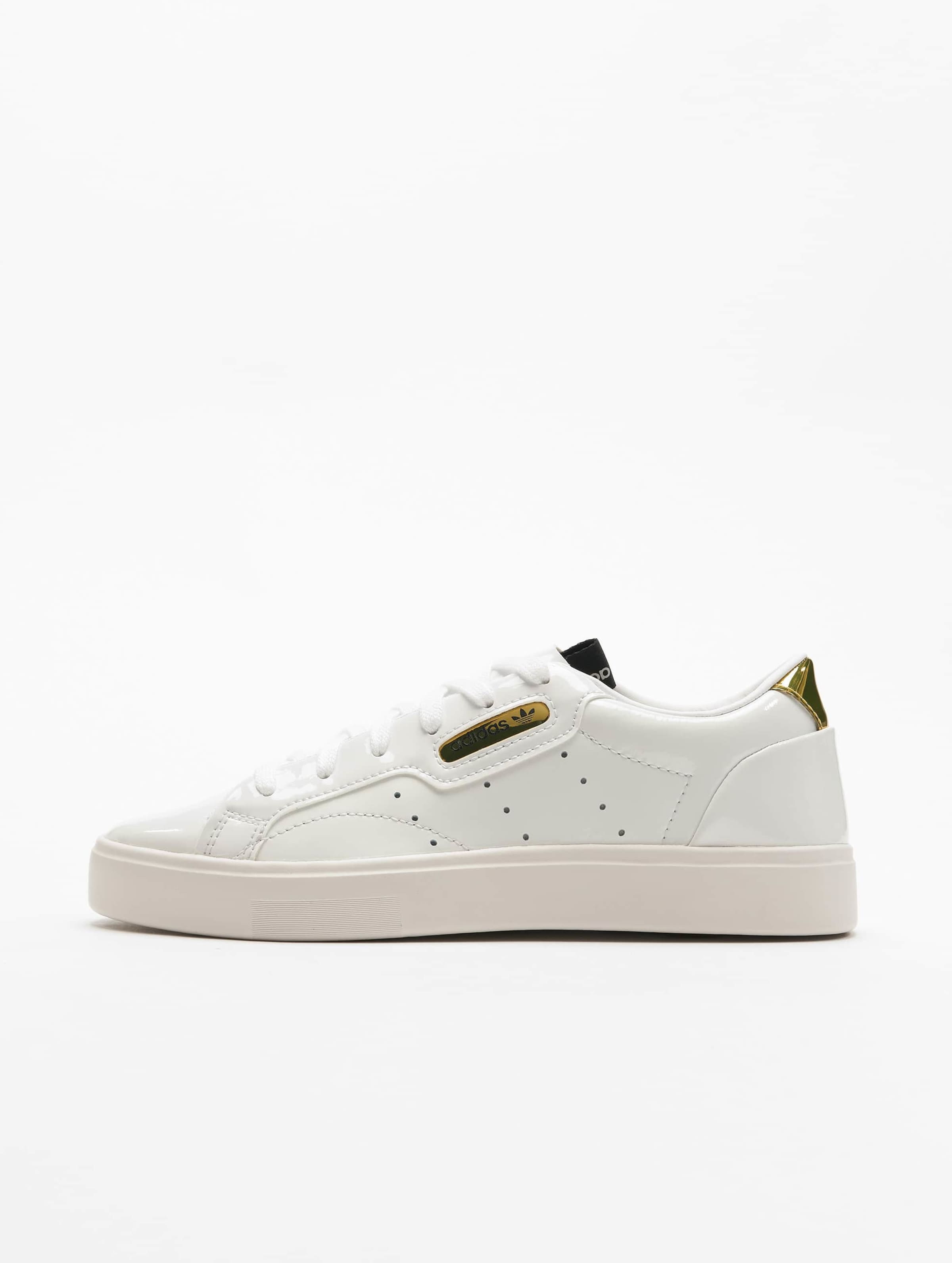 Adidas originals shop white sleek sneakers