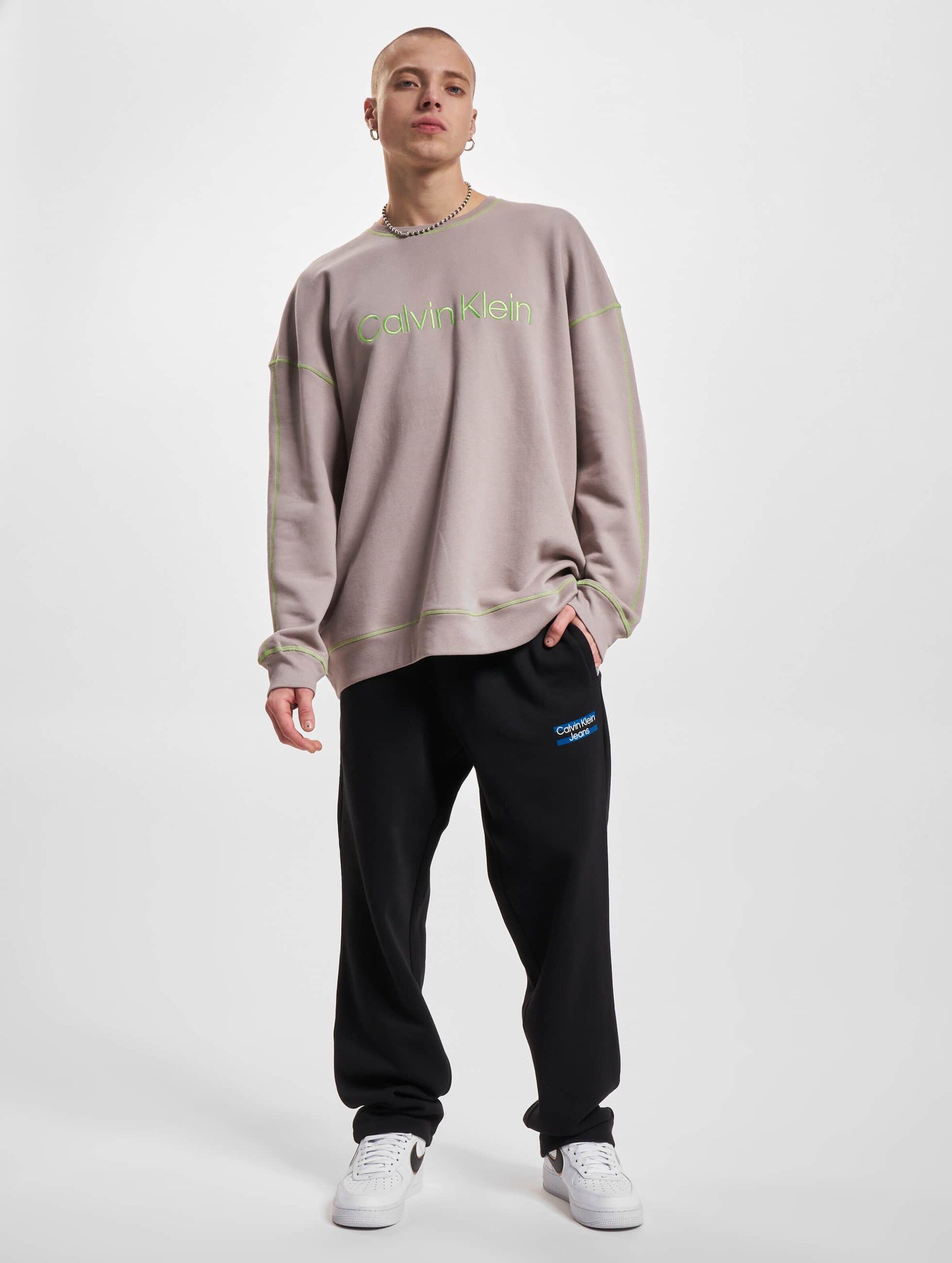 Calvin klein sweatshirt on sale with logo stripe