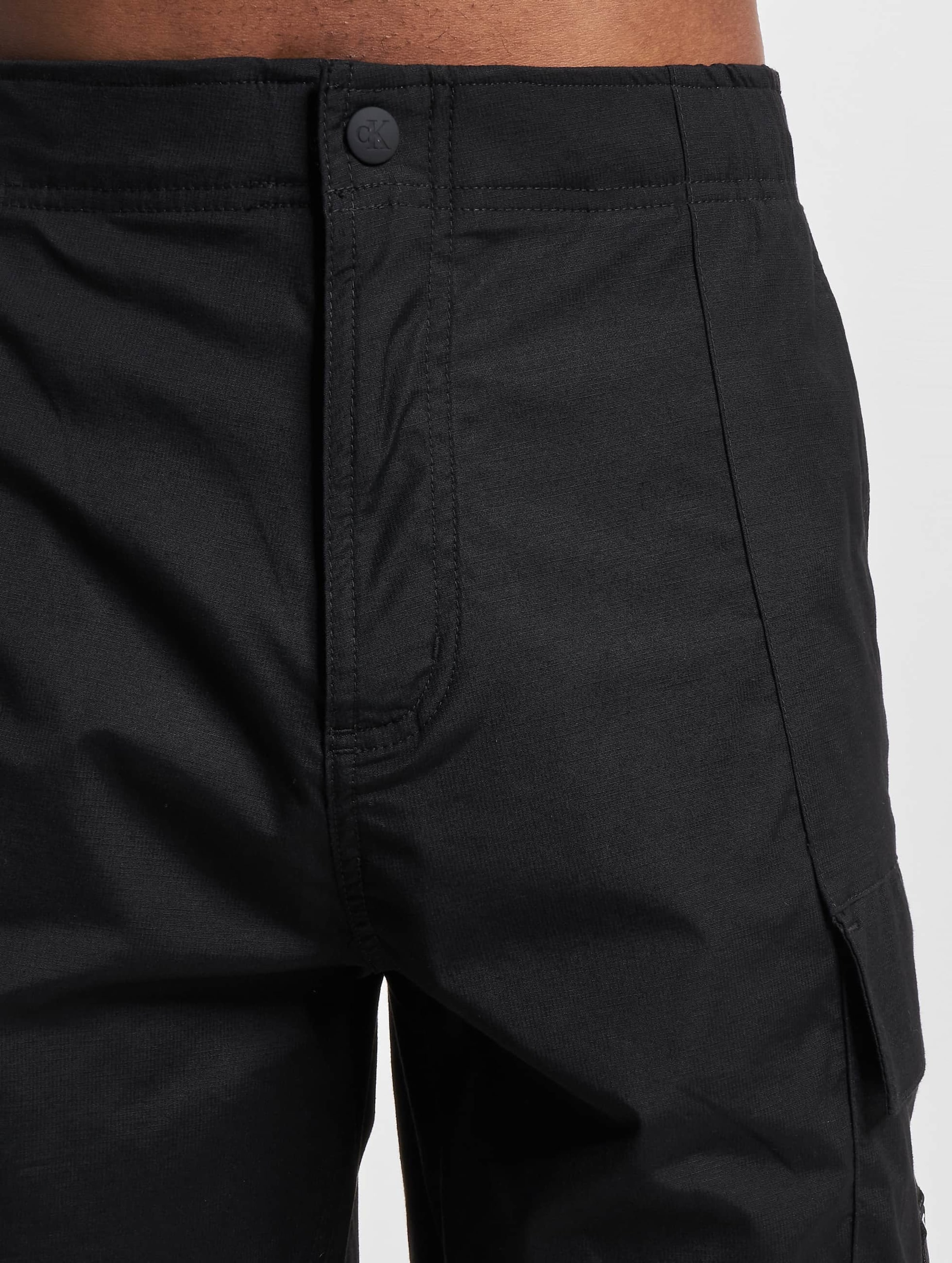 Calvin Klein Jeans Washed Cargo Woven Shorts | DEFSHOP | 22966