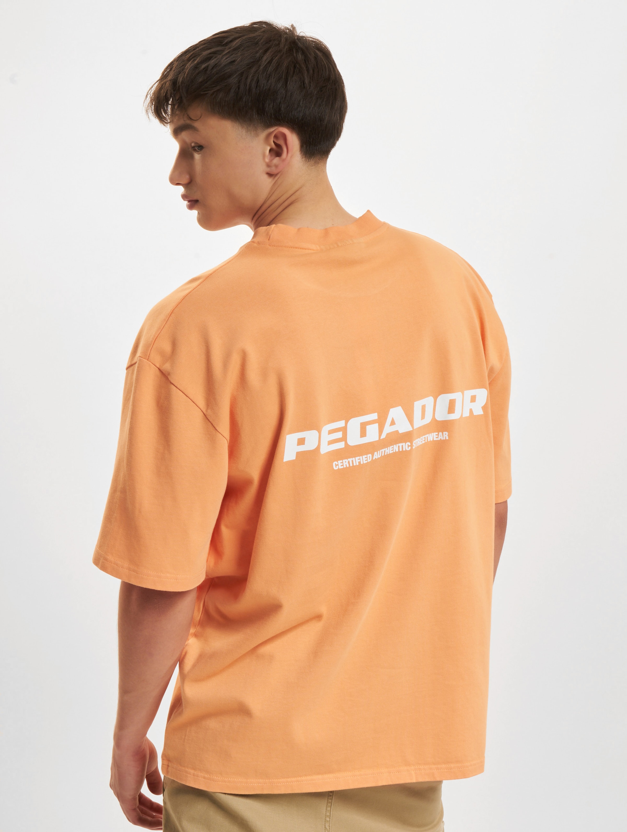 PEGADOR Colne Logo Oversized T-Shirts Mannen op kleur oranje, Maat XL