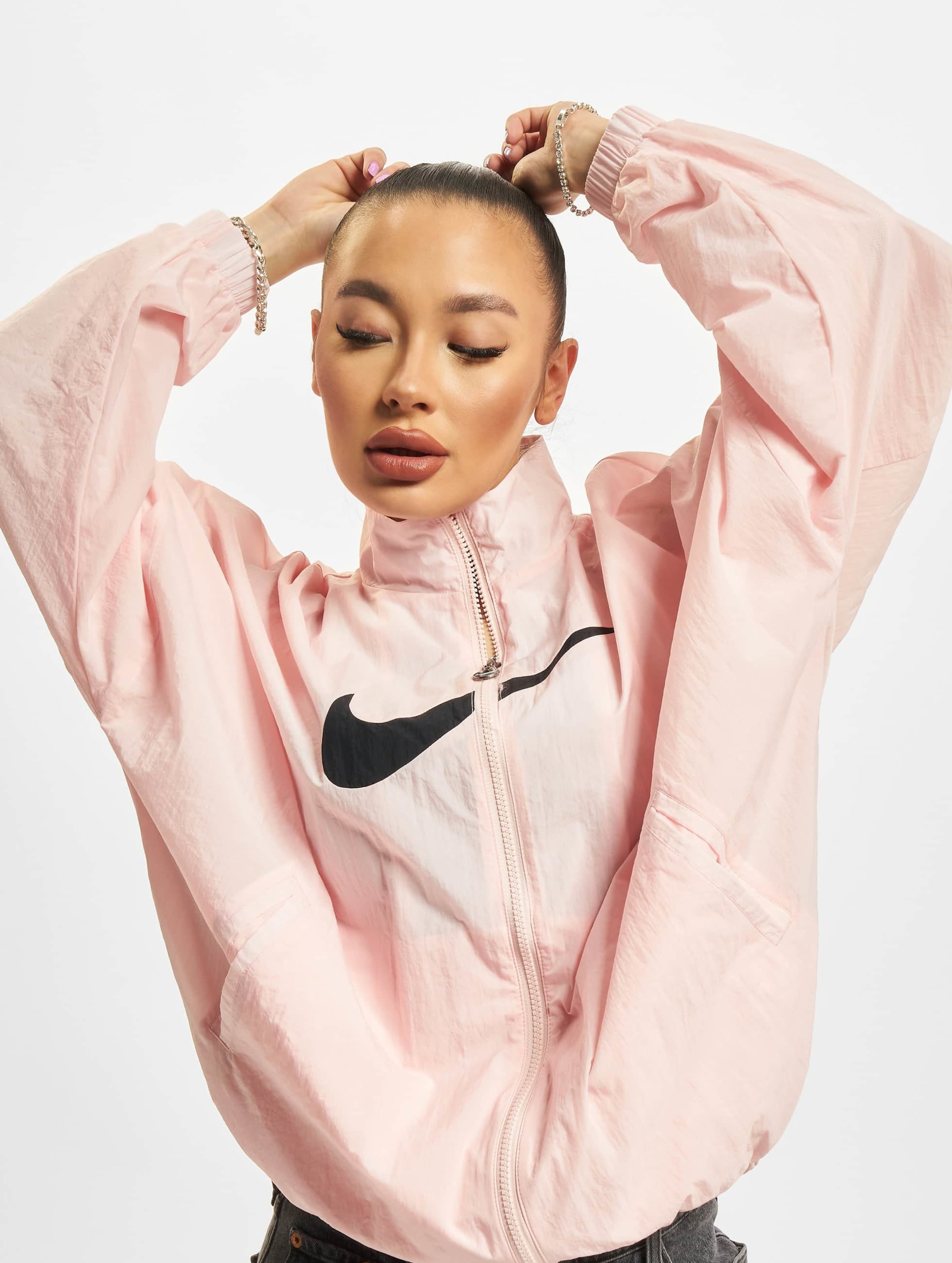 Nike big on sale swoosh jacket pink