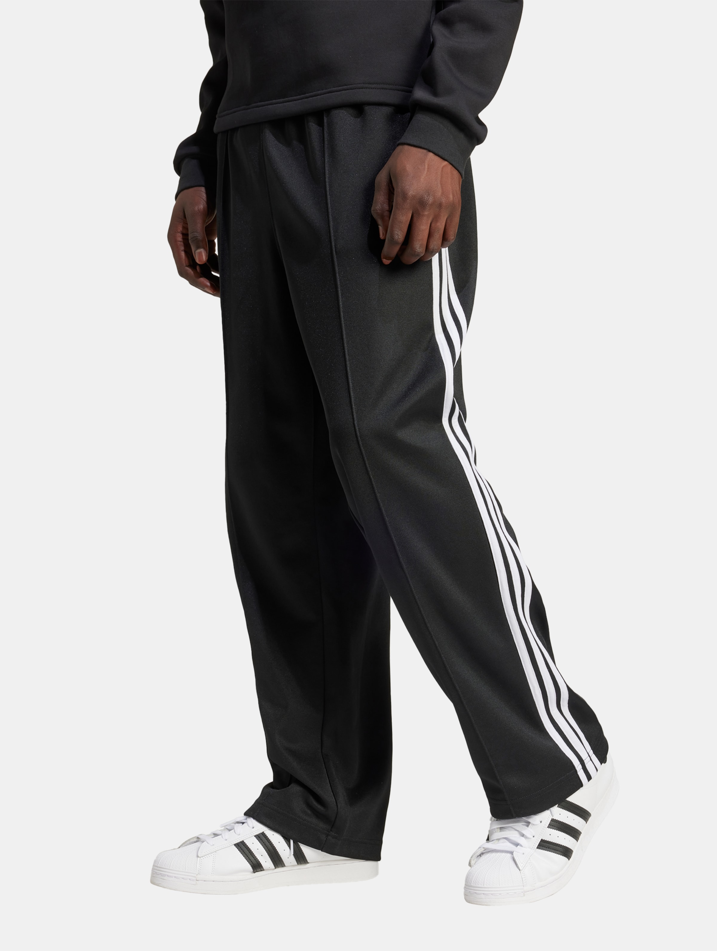 adidas Originals Baggy Fit Firebird Jogginghosen Männer,Unisex op kleur zwart, Maat XL