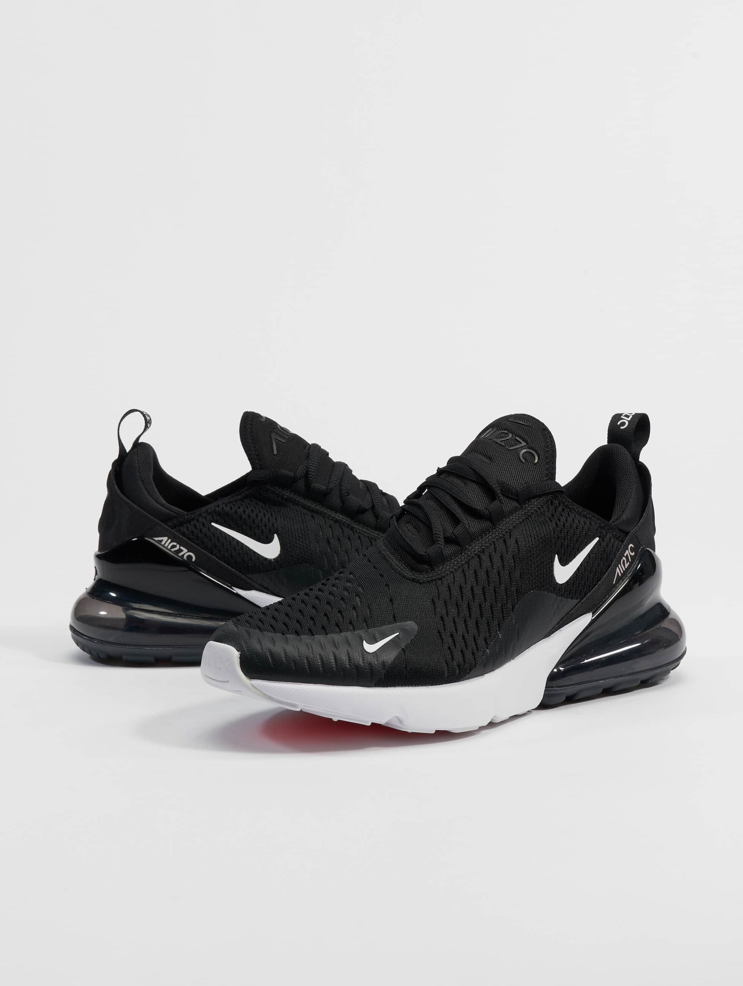 Black and white nike air max 270 sales junior