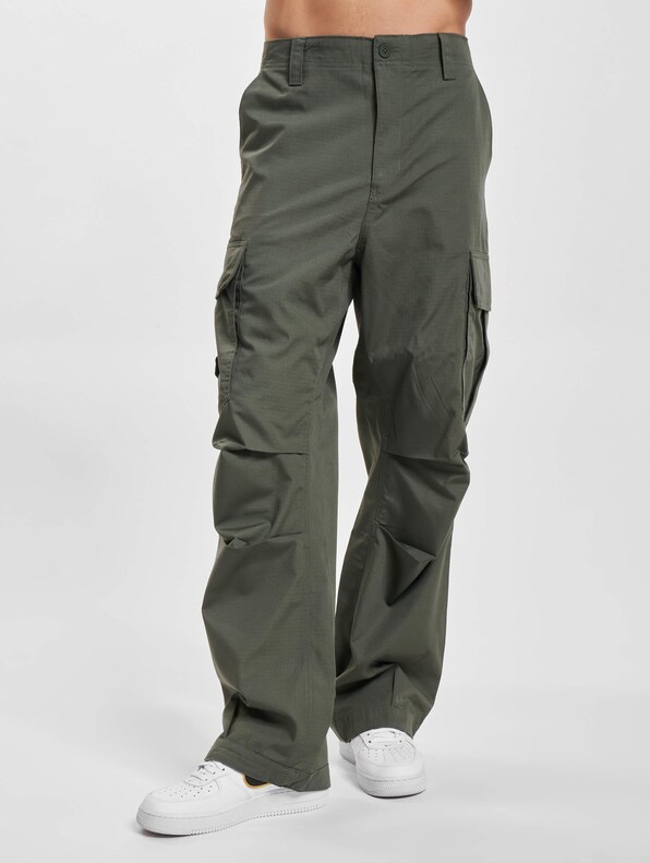 Tommy Jeans AIDEN BAGGY PANT - Cargo trousers - avalon green/olive