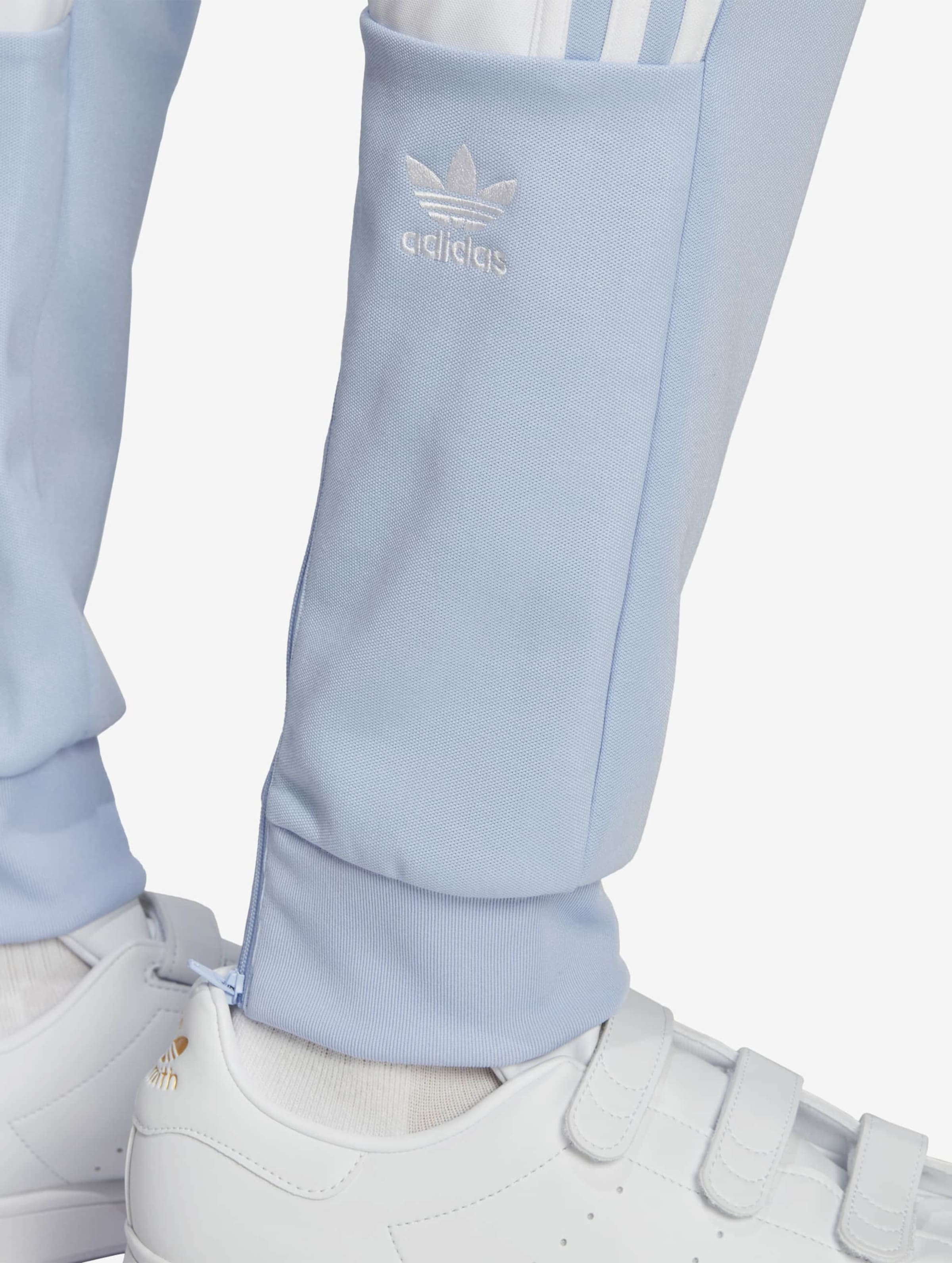 Adidas sst track pants ash sales blue