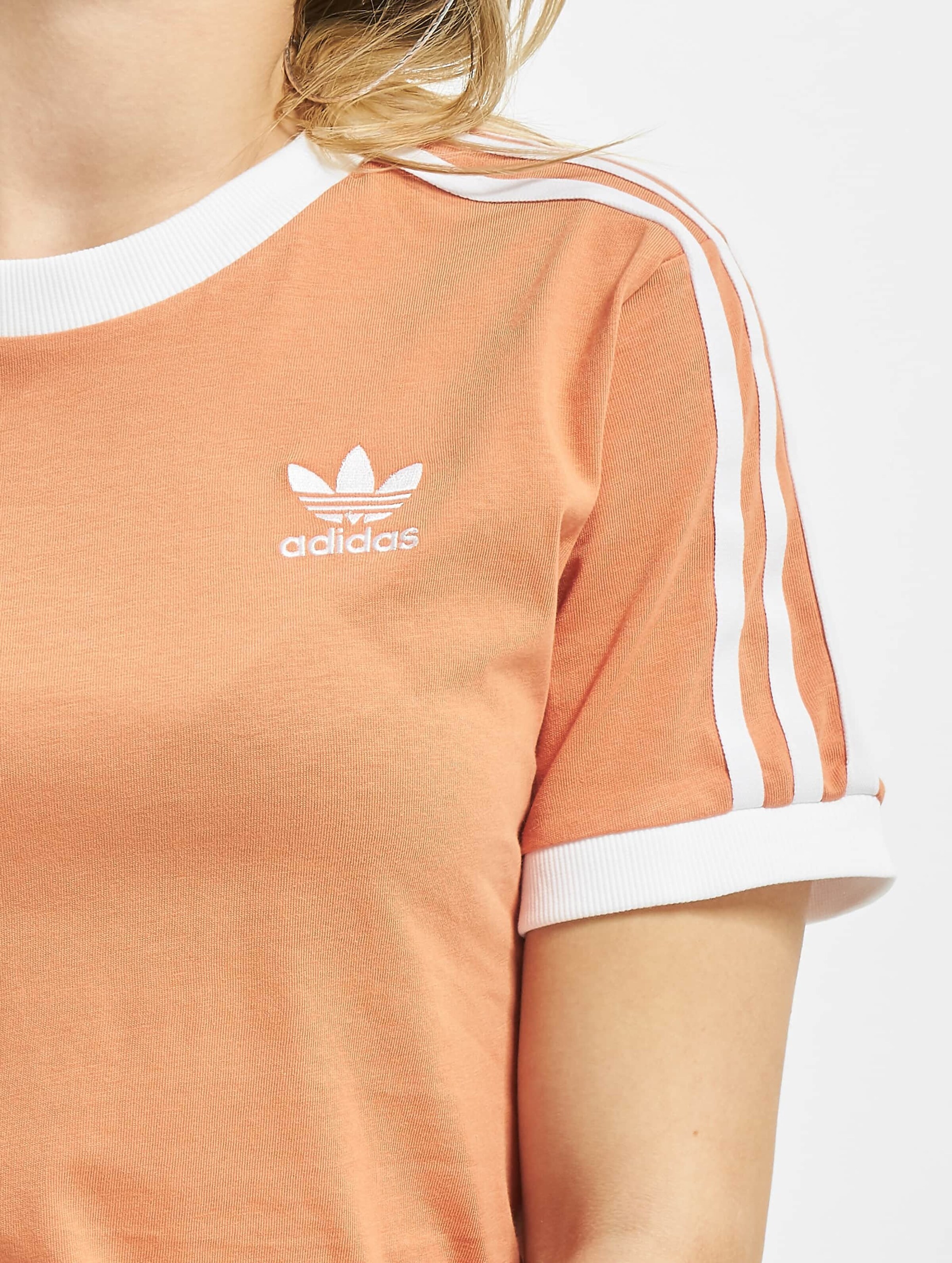 Adidas store peach shirt