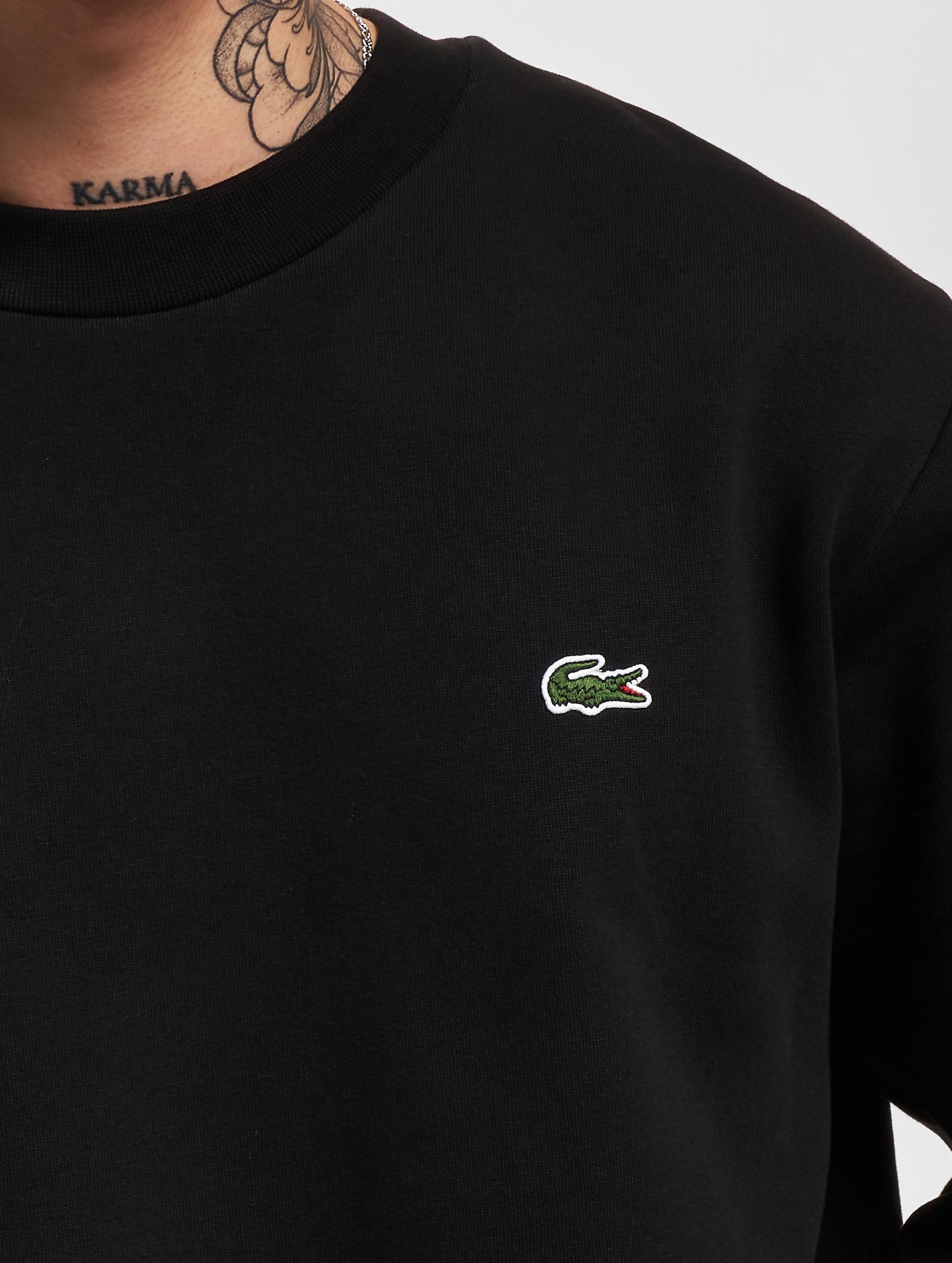 Lacoste best sale logo sweater