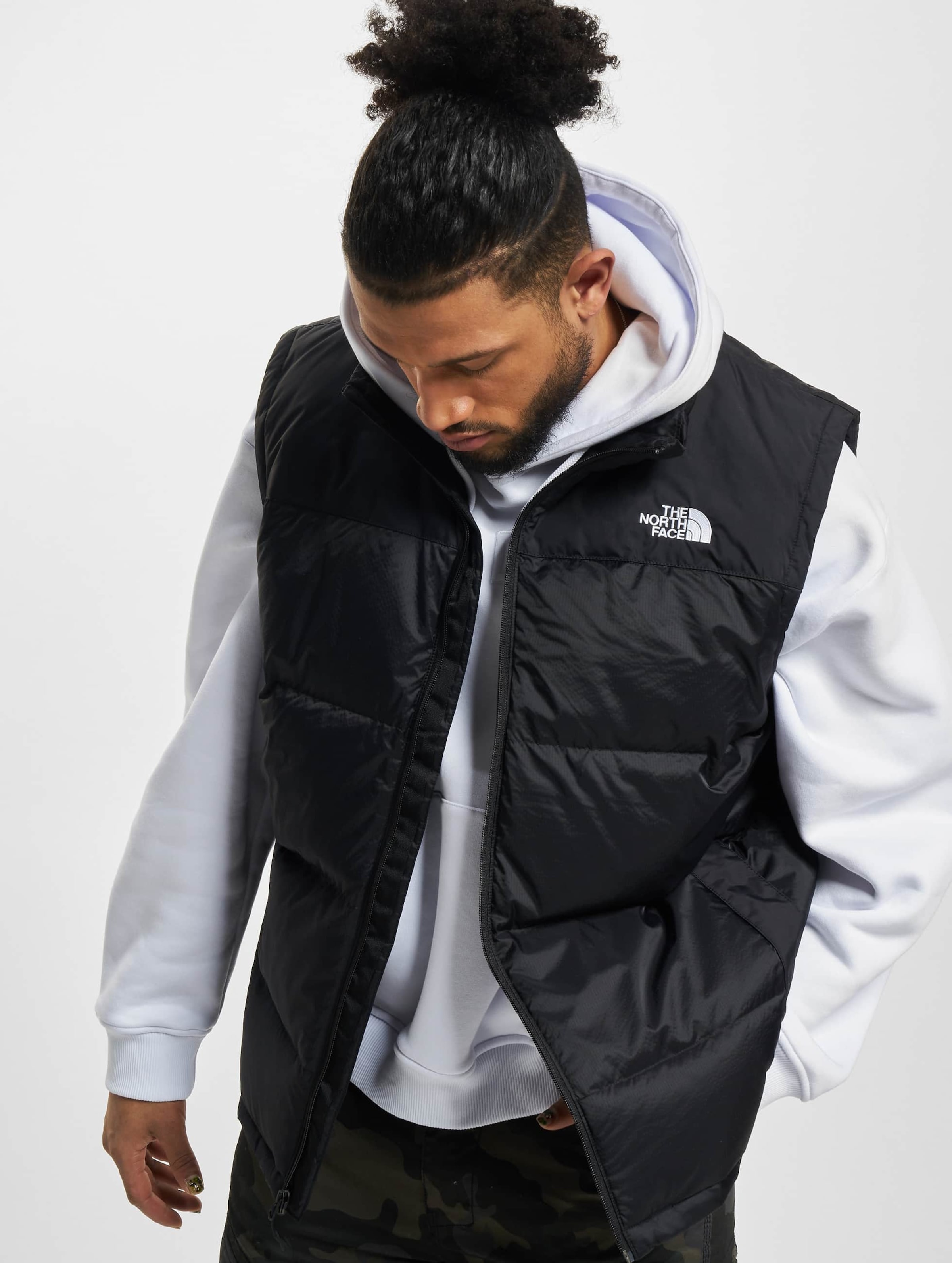 North face black store vest