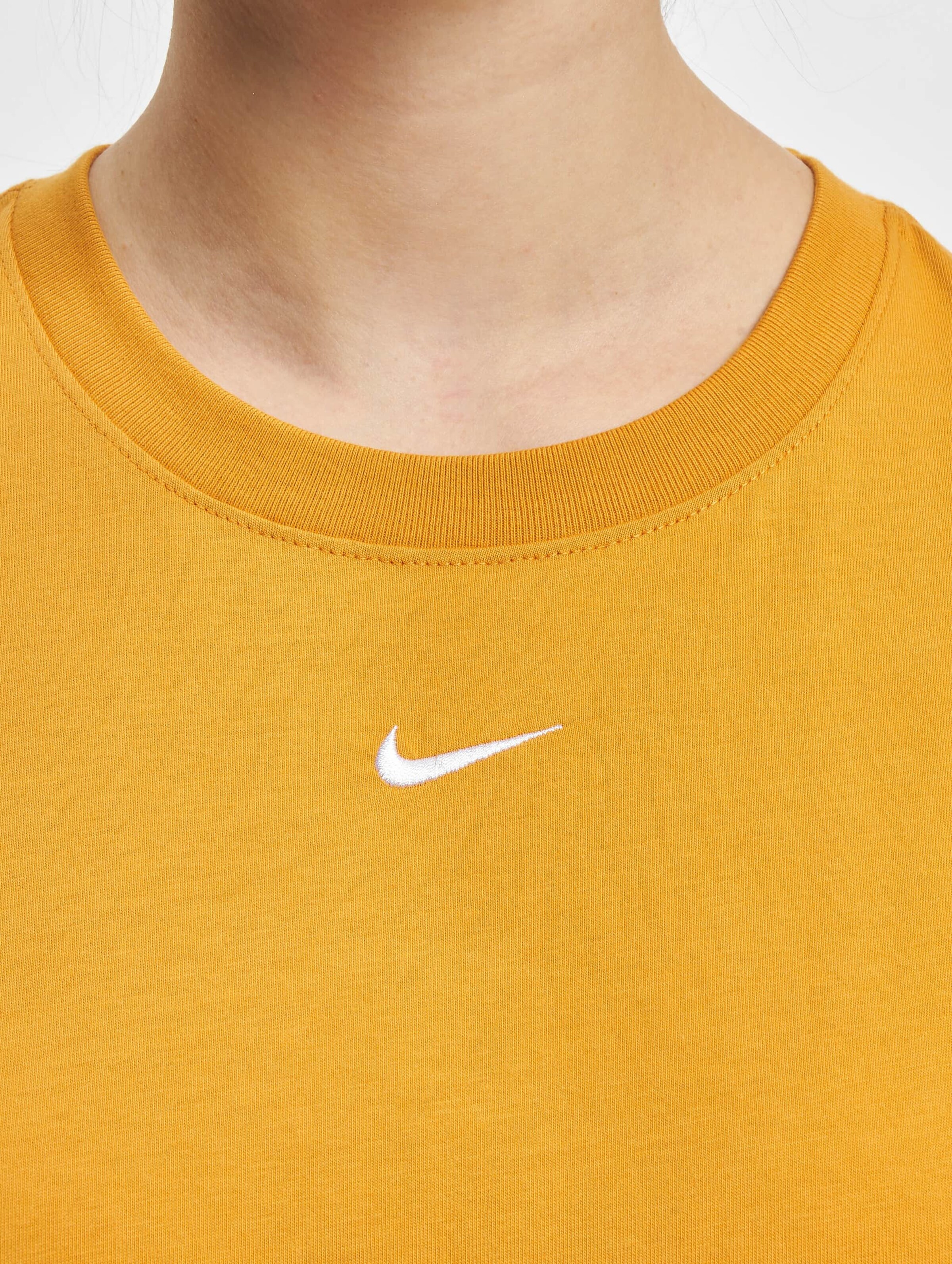 Black nike shirt with yellow swoosh deals