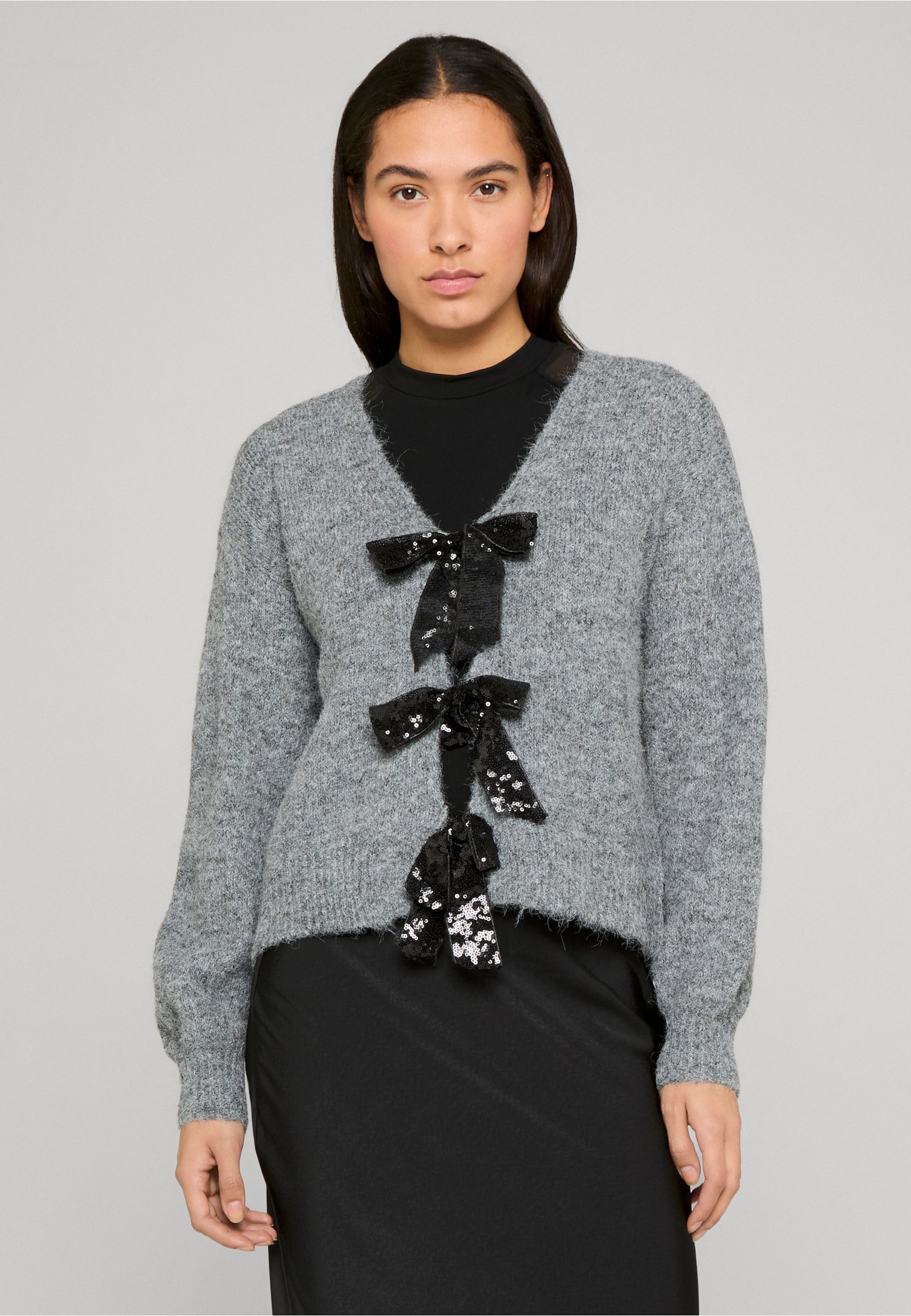 Estelou Glitter Bow Cardigan